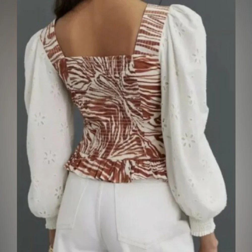 ANTHROPOLOGIE Love The Label Smocked Eyelet Puff Sleeve Blouse with Zebra Bodice